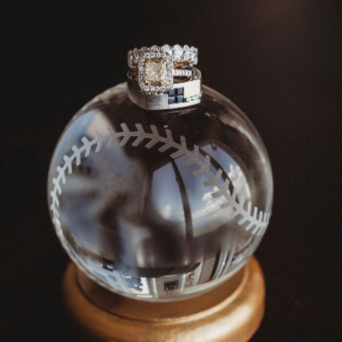 Wedding ring on baseball ornament